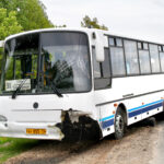 white KAVZ 4238 Aurora interurban coach after an accident